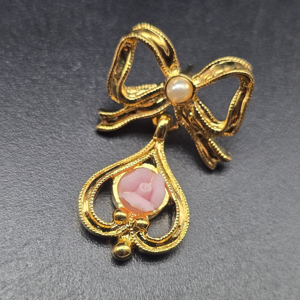 Avon Gold Tone Bow Pin with Pink Carved Flower Vintage Jewelry